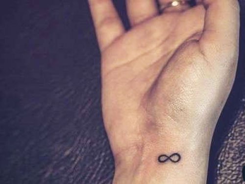 17 Meaningful Small Wrist Tattoos For Women in 2024 3