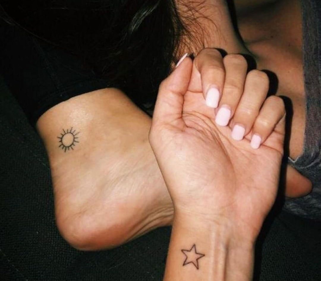 Matching tattoos for girls weave a tale of unity & friendship, etching their shared journeys and dreams into timeless symbols of sisterhood and solidarity.