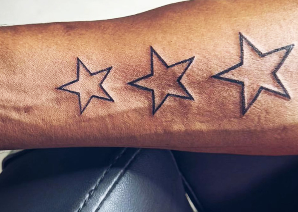 Men with Star Tattoos