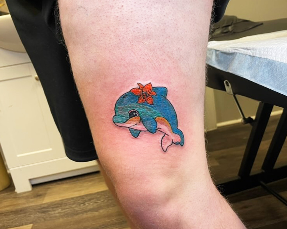 What Does a Dolphin Tattoo Mean on a Woman?